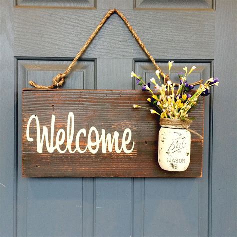 hanging welcome sign outdoor|More.